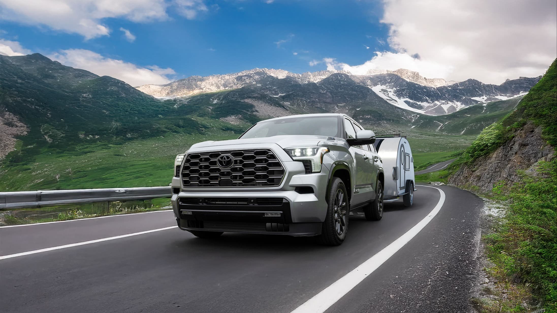 Lifestyle image of Toyota Sequoia towing RV