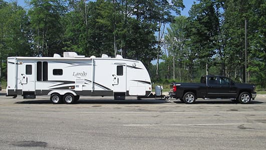 Truck with Air Lift Suspension towing camper